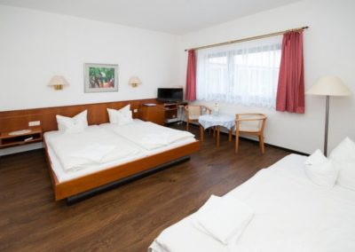 Double bed in the Hotel am Wasserturm